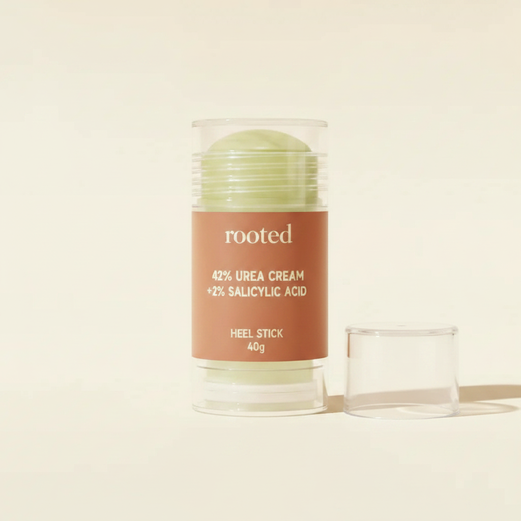 Rooted Heel Stick with the cap off, showing the 42% urea balm